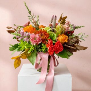 Nothing brightens up a dreary September day quite like a fall-bright bouquet!